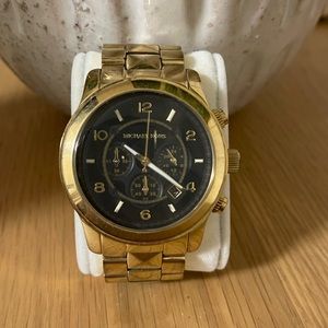Micheal Kors gold and black watch